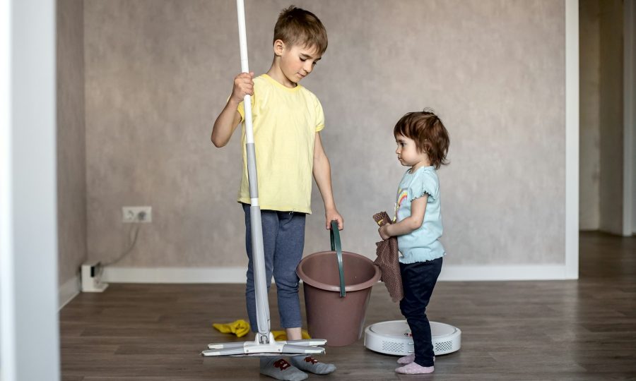 House cleaning, help, housework. The children help their mother clean up.